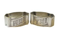 Pair of stylish, hammered, silver plate, Me and You, napkin holders from the Art Deco period.