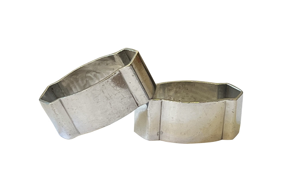 Pair of stylish, hammered, silver plate, Me and You, napkin holders from the Art Deco period.