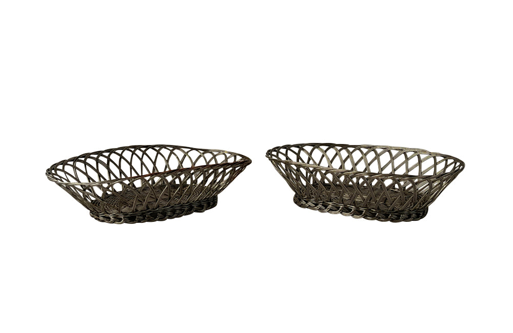 Pair French silver plate woven bread basket in oval form.