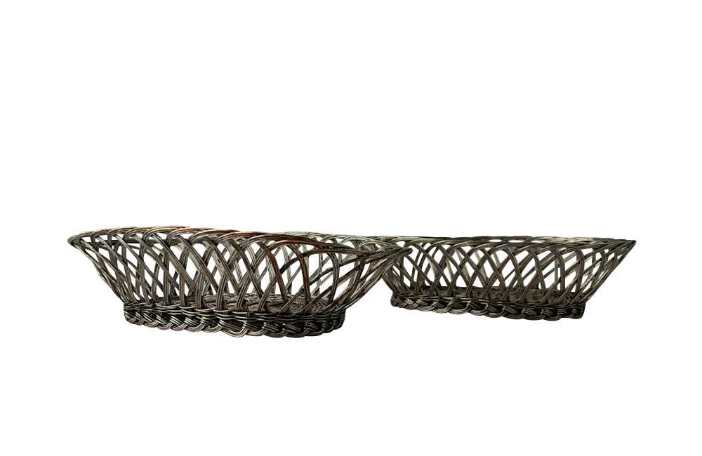 Pair French silver plate woven bread basket in oval form.