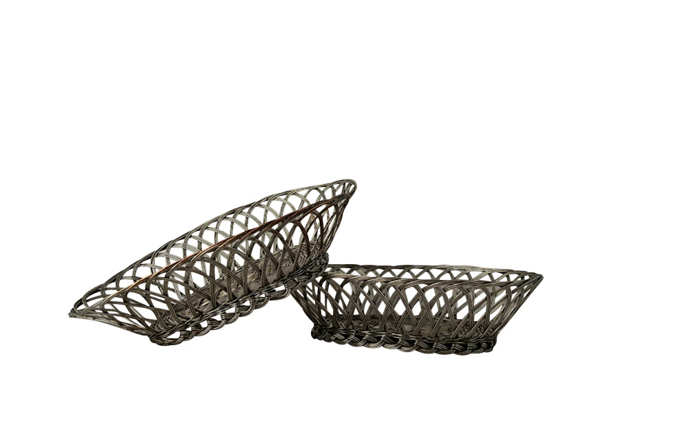 Pair French silver plate woven bread basket in oval form. 