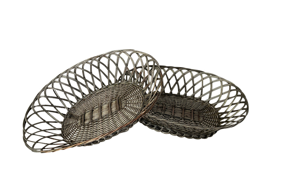 Pair French silver plate woven bread basket in oval form.