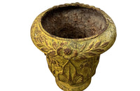 Pair of charming early 20th century French small cast iron urns decorated with daisies and leaves