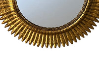 round gilt iron mirror in the form of a sun. Spain c.1970