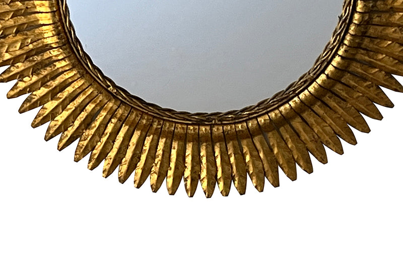 round gilt iron mirror in the form of a sun. Spain c.1970