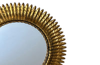 round gilt iron mirror in the form of a sun. Spain c.1970