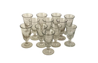 Early 20th century set of twelve French bistro glasses.