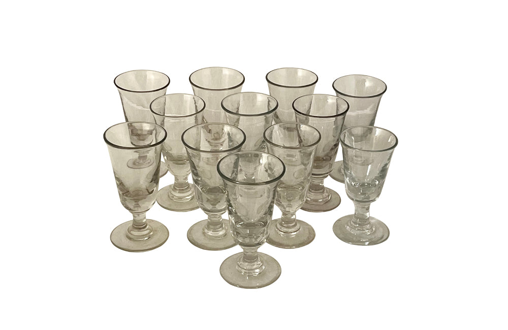 Early 20th century set of twelve French bistro glasses.