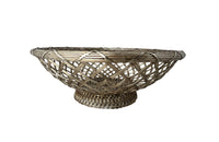 20th century round French silver plate open weave bread basket with decorative rim in the Neo-Classical style on raised base. 