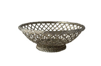 20th century round French silver plate open weave bread basket with decorative rim in the Neo-Classical style on raised base.