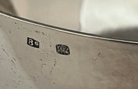 Decorative silver plate bowl with dolphin handles on raised foot and stamped with makers mark B.R.