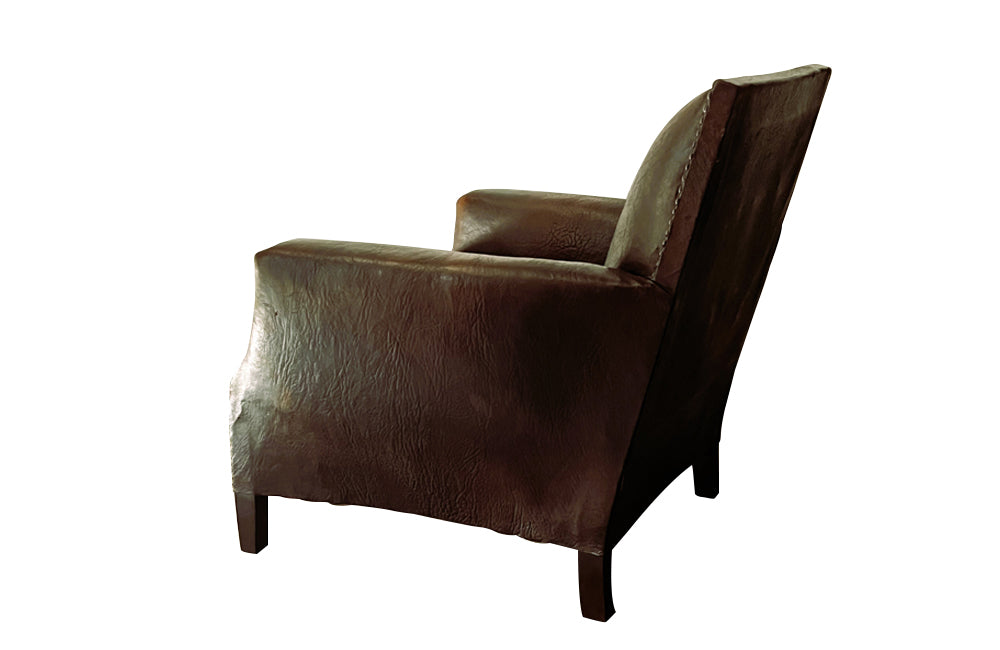 Antique Armchair - 1920's French leather club chair with studded square back and elegant curved shape and studding to front arm posts.