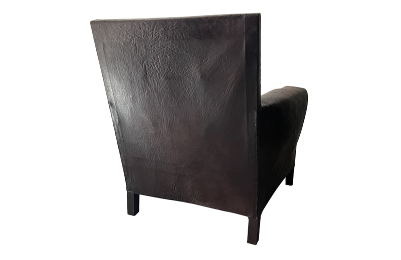 Antique Armchair - 1920's French leather club chair with studded square back and elegant curved shape and studding to front arm posts.