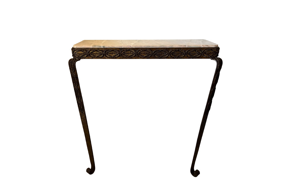Mid 20th Century Spanish brutalist gilt iron console with pink Pyrenean marble with green veining.