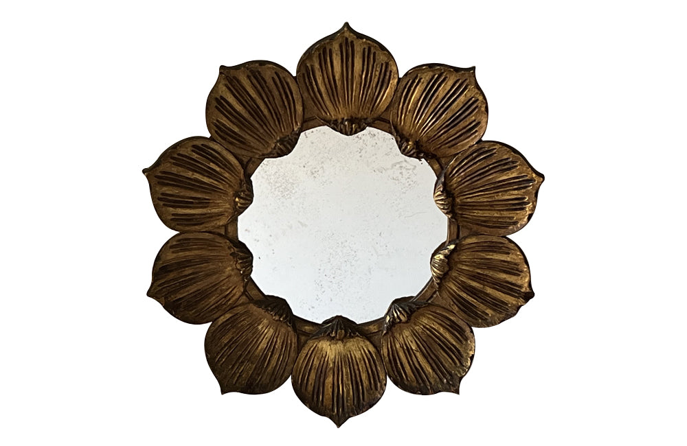 Mid 20th Century decorative round Spanish giltwood carved mirror.