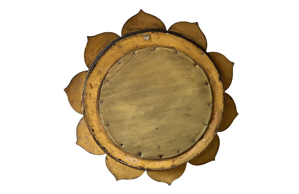 Mid 20th Century decorative round Spanish giltwood carved mirror.