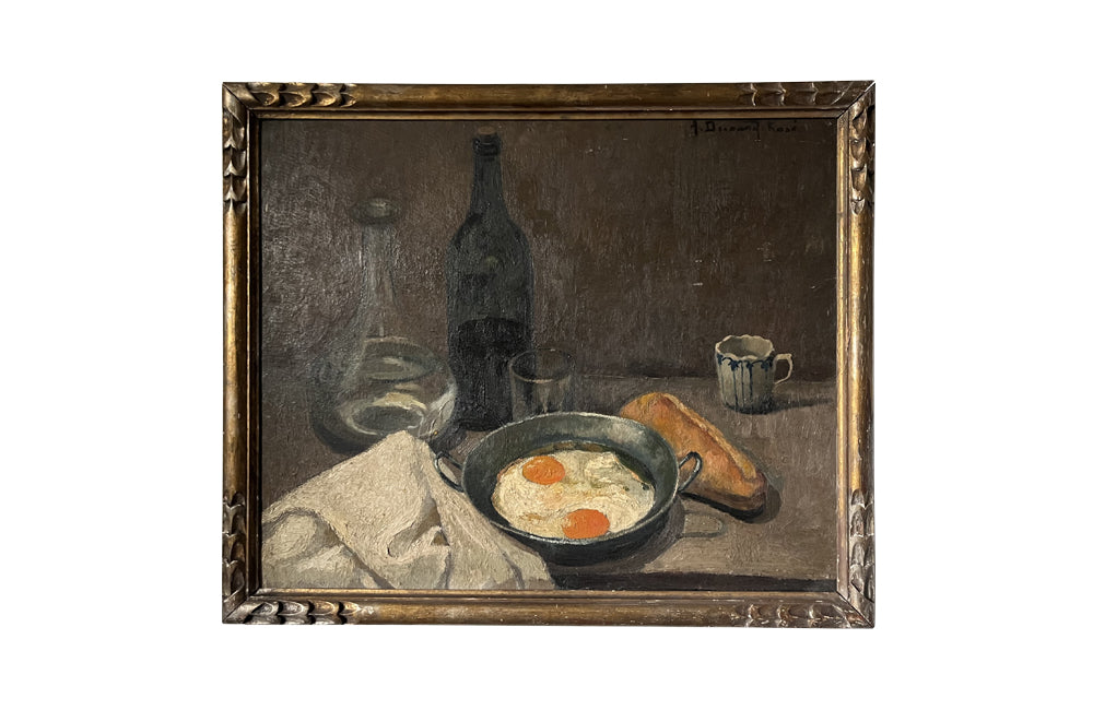 Lovely, French still life painting of fried eggs in a pan, a carafe of water, bottle of wine, glass, loaf of bread, ceramic cup and cloth napkin.