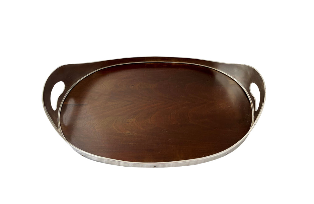 elegant and stylish oval silverplate and wooden tray by the design house Valmazan, Spain.