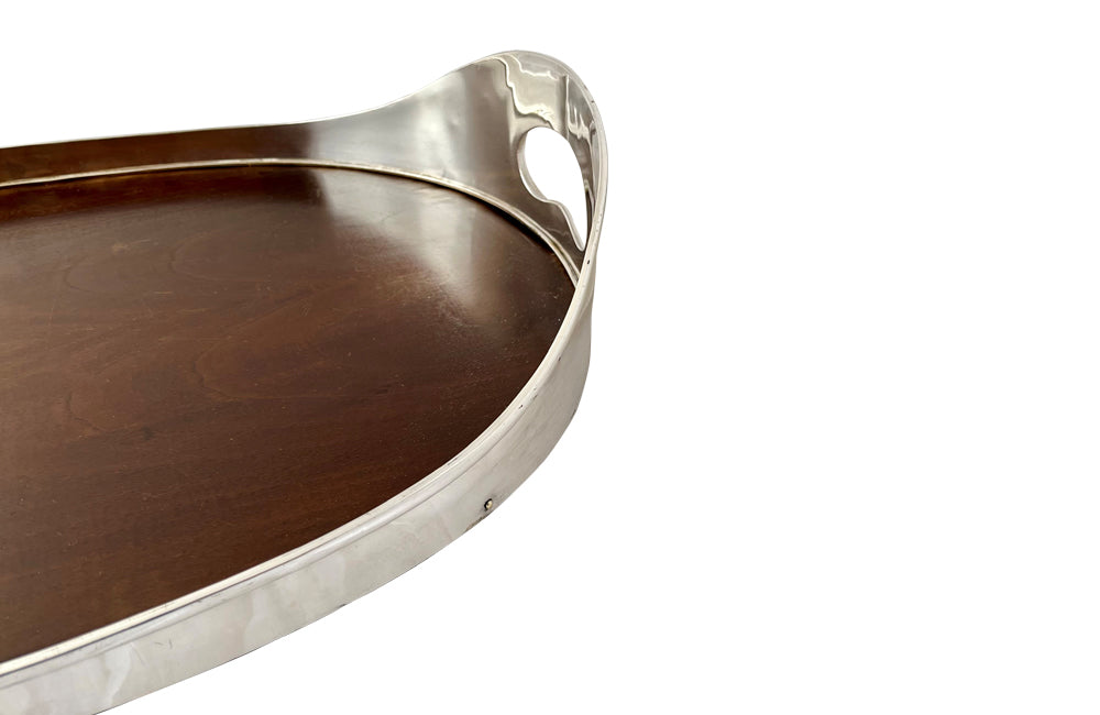 elegant and stylish oval silverplate and wooden tray by the design house Valmazan, Spain.