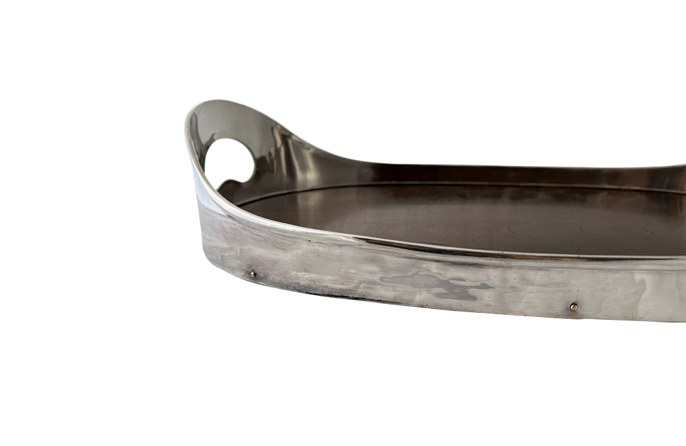 elegant and stylish oval silverplate and wooden tray by the design house Valmazan, Spain.