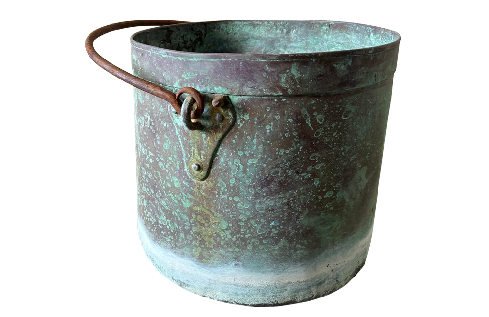 French copper vat planter with banded decoration and iron swing handle.  Drainage holes for planter use with lovely natural verdigris patination.  Early 1900s. AD & PS Antiques