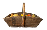 Antique wooden harvest panier filled with marble trompe l'oeil lemons, limes, oranges and mandarins.Italian