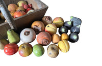 Wooden harvest panier, filled with a large collection of assorted Italian marble and alabaster fruit