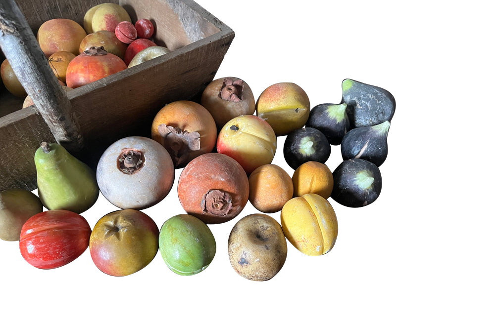 Wooden harvest panier, filled with a large collection of assorted Italian marble and alabaster fruit