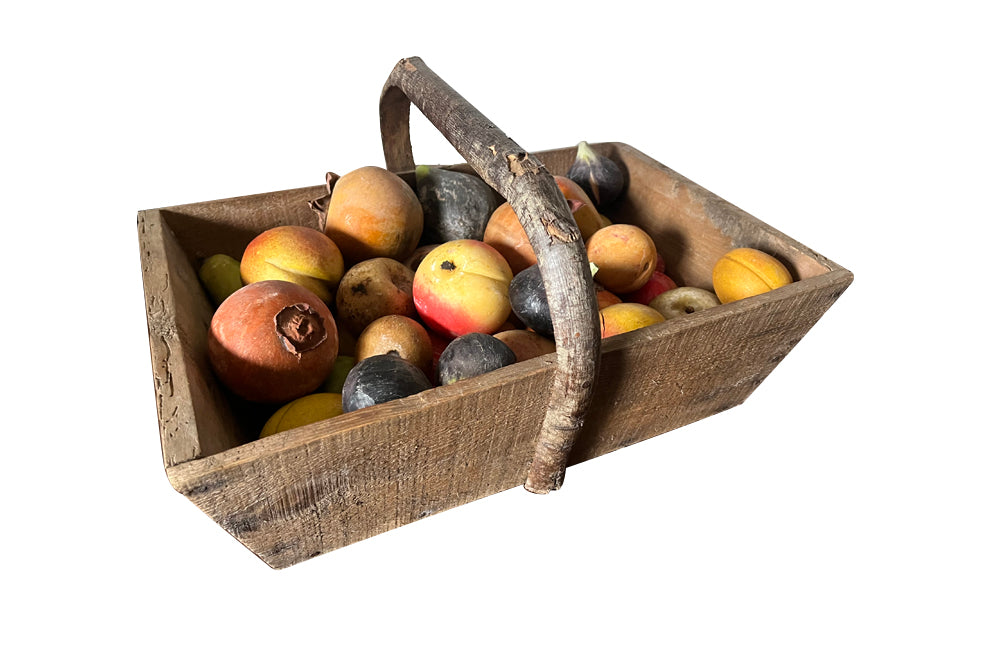 Wooden harvest panier, filled with a large collection of assorted Italian marble and alabaster fruit