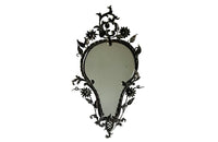 Pretty wrought iron mirror with floral and foliate decoration circa 1900