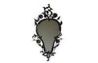 Pretty wrought iron mirror with floral and foliate decoration circa 1900