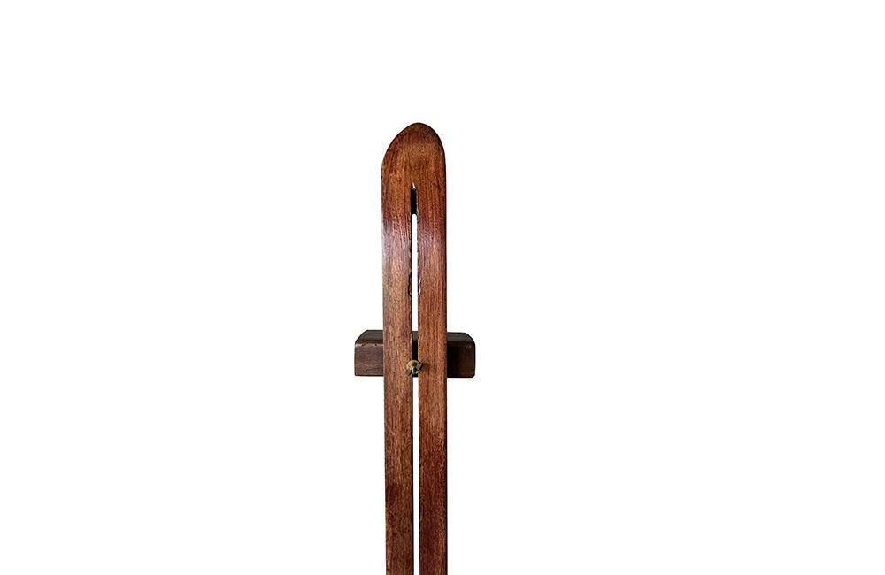 Charming rustic easel with sliding height adjustable shelf .