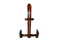 Charming rustic easel with sliding height adjustable shelf .