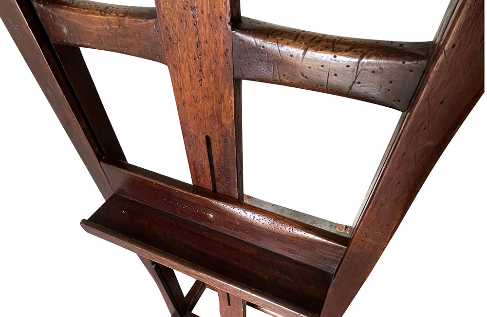 Charming rustic easel with sliding height adjustable shelf .