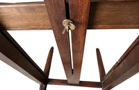 Charming rustic easel with sliding height adjustable shelf .