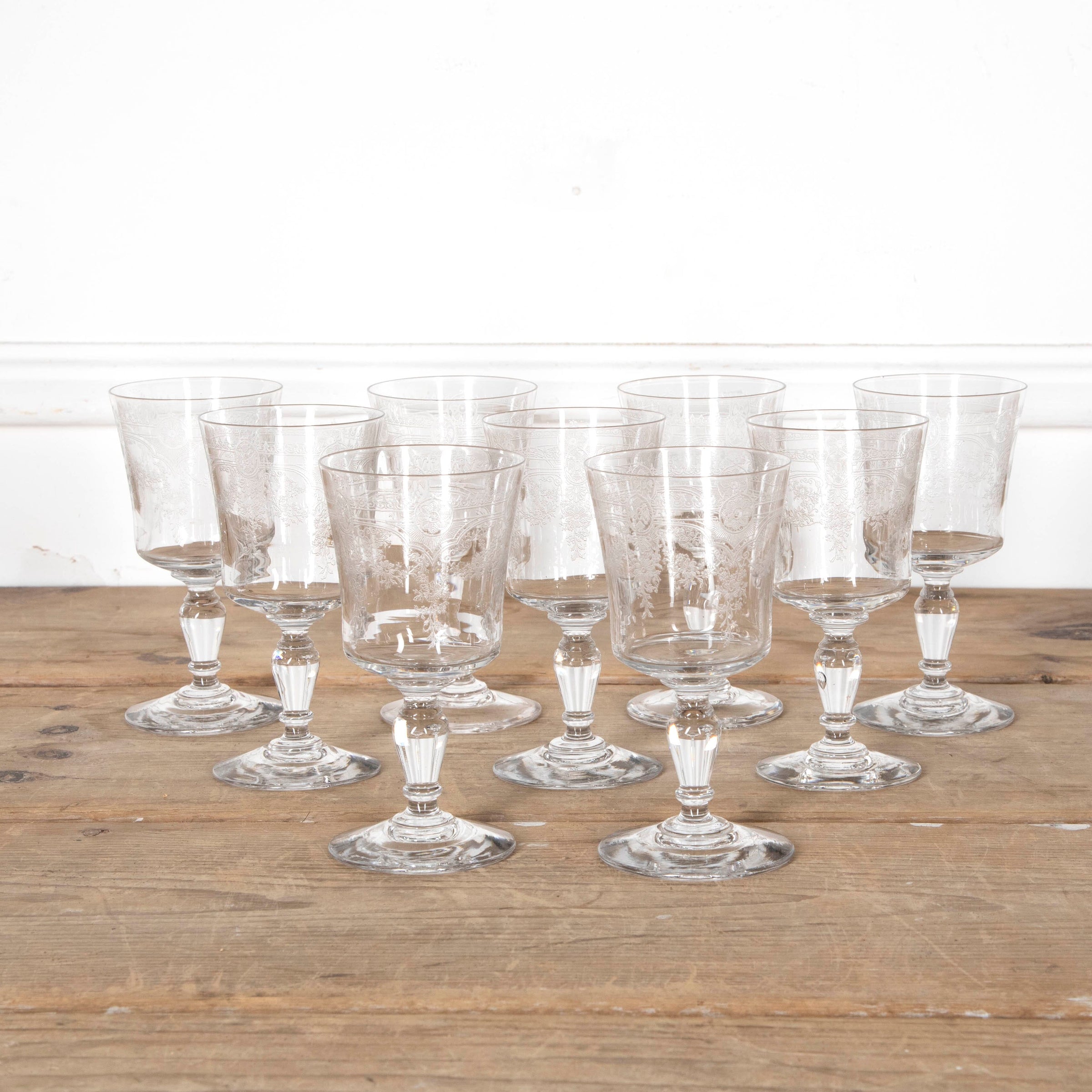 BEAUTIFUL SET OF NINE ETCHED WINE GLASSES