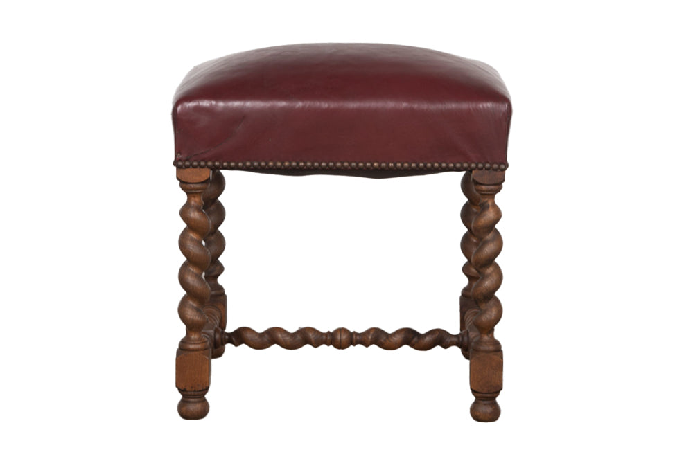 Early 20th century French oak barley twist stool upholstered in burgundy leather