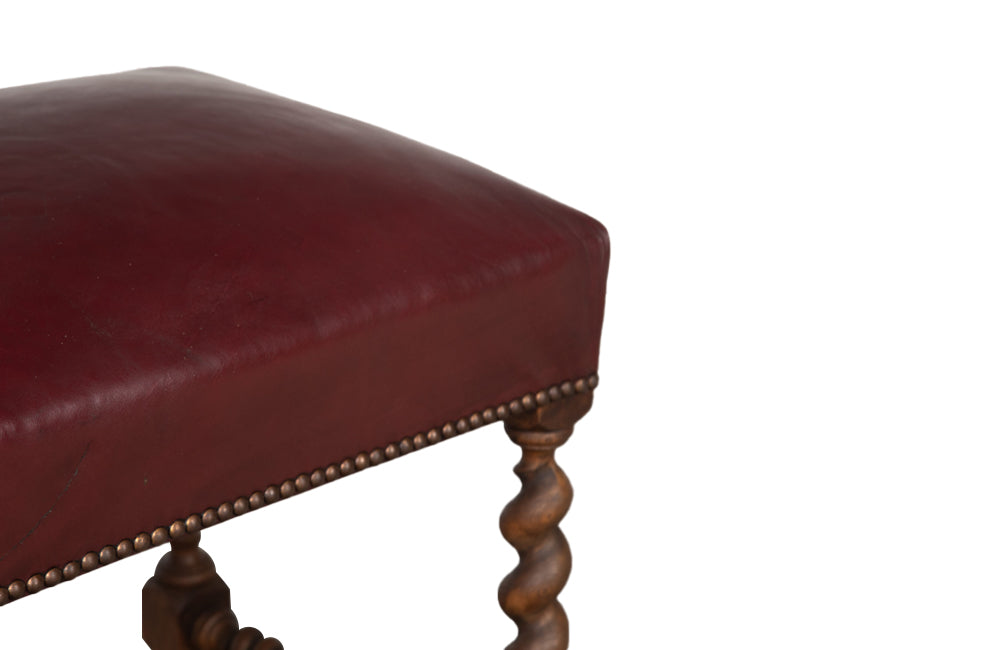 Early 20th century French oak barley twist stool upholstered in burgundy leather