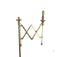telescopic brass reading floor lamp in the Art Deco style with adjustable concertina arm.