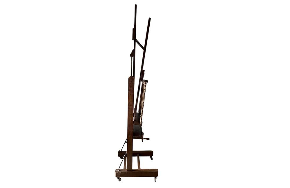 French oak artist's studio easel features a double crank mechanism allowing for the height to be adjustable as well as forward pitch. 19th century