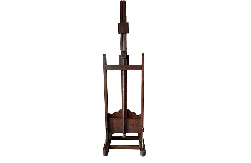 French oak artist's studio easel features a double crank mechanism allowing for the height to be adjustable as well as forward pitch. 19th century