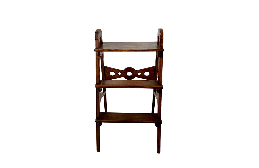 Set of oak three tiered library steps. These stylish French steps feature a geometric design and elegant tapered legs. Circa 1930