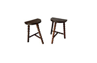 Pair of vintage demi lune tripod stools with bobbin carved legs.