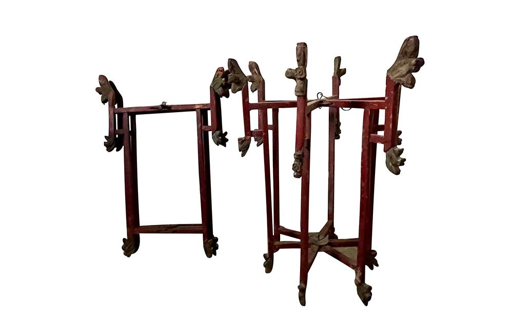Wonderful pair of Chinese, folding wooden hanging lanterns. Dating to the early 20th century, these lovely hanging candle lights have fabulous patination and are full of atmosphere in their untouched and worn condition. Circa 1920.