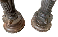 Pair of 19th century French cast iron vases in tulip form with ivy and foliate decoration to both sides. Stamped Bussy.