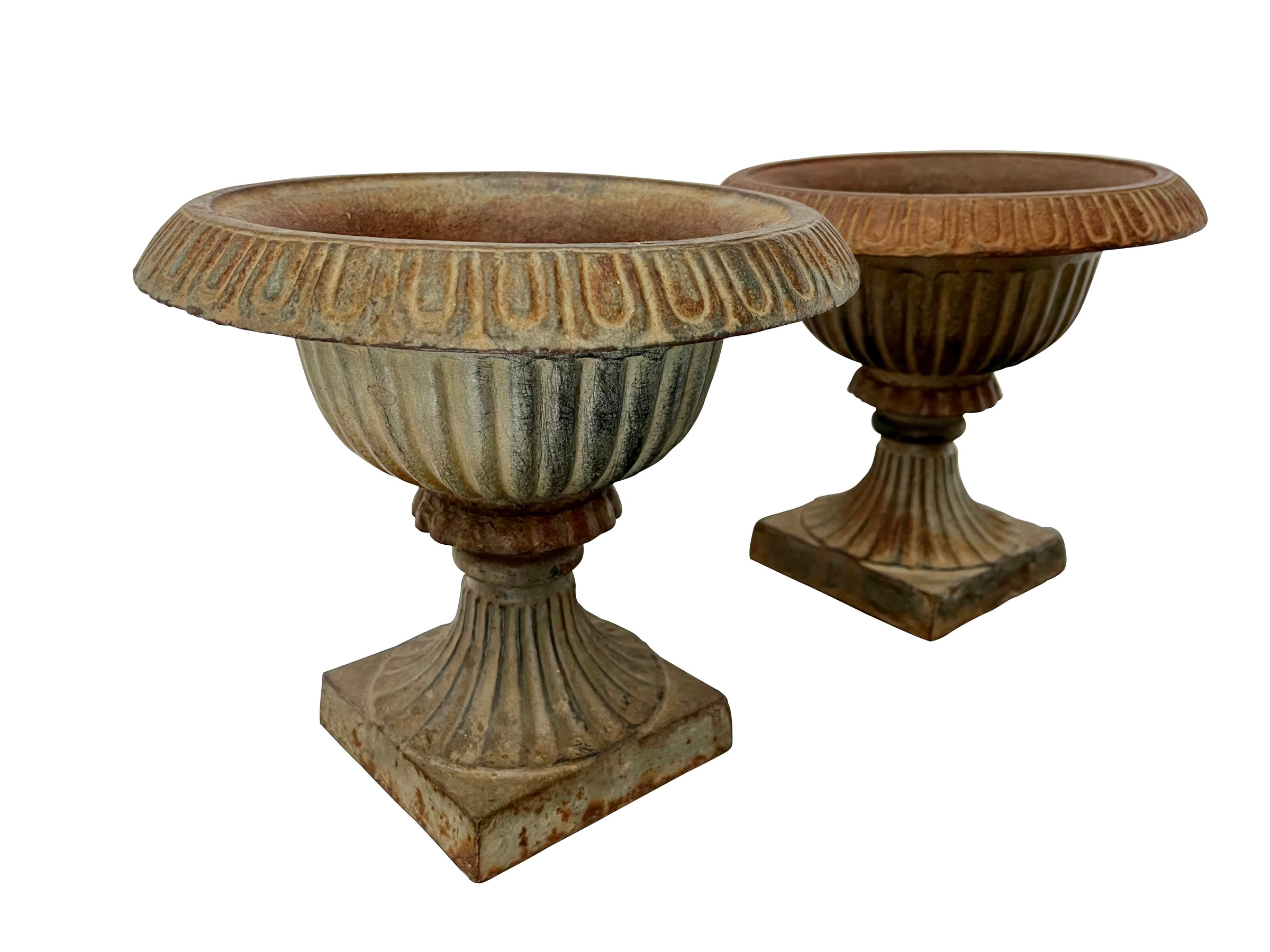 Pair of pretty French cast iron medici garden urns in the Neo-Classical style with traces of original blue paint. Circa 1930