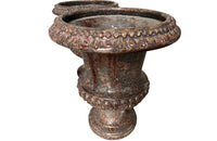 pair of beautiful French Medici terracotta urns in a faux marble glazed finish.