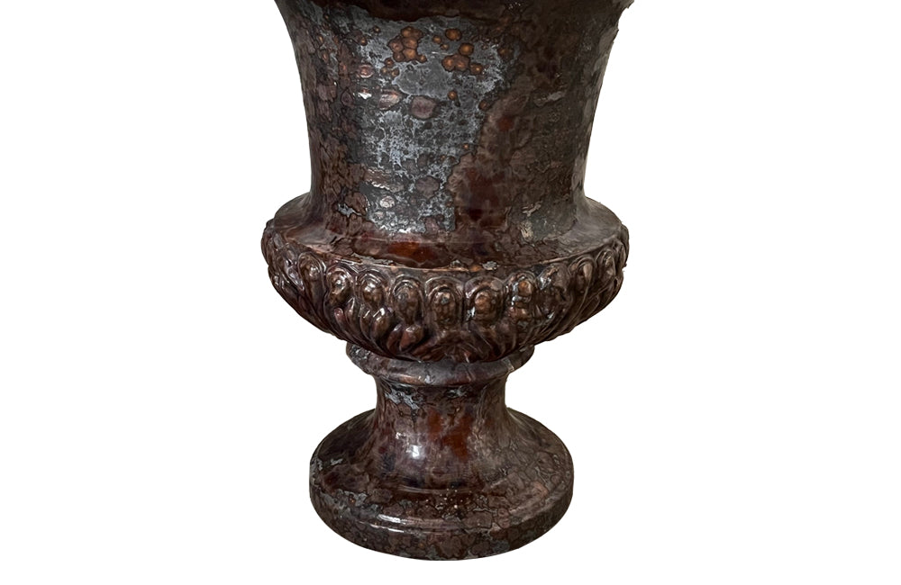 pair of beautiful French Medici terracotta urns in a faux marble glazed finish.