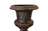pair of beautiful French Medici terracotta urns in a faux marble glazed finish.