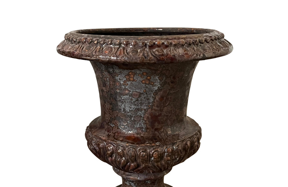 pair of beautiful French Medici terracotta urns in a faux marble glazed finish.